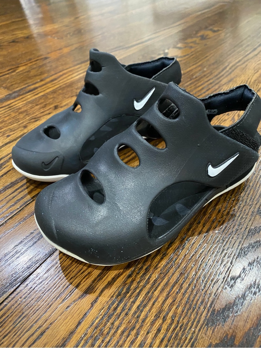 Nike Kids Black Slip-On Water Sandals with White Swoosh